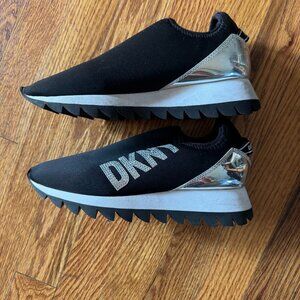 DKNY slip on sneakers. Black w/ silver accents. Size 6.5.